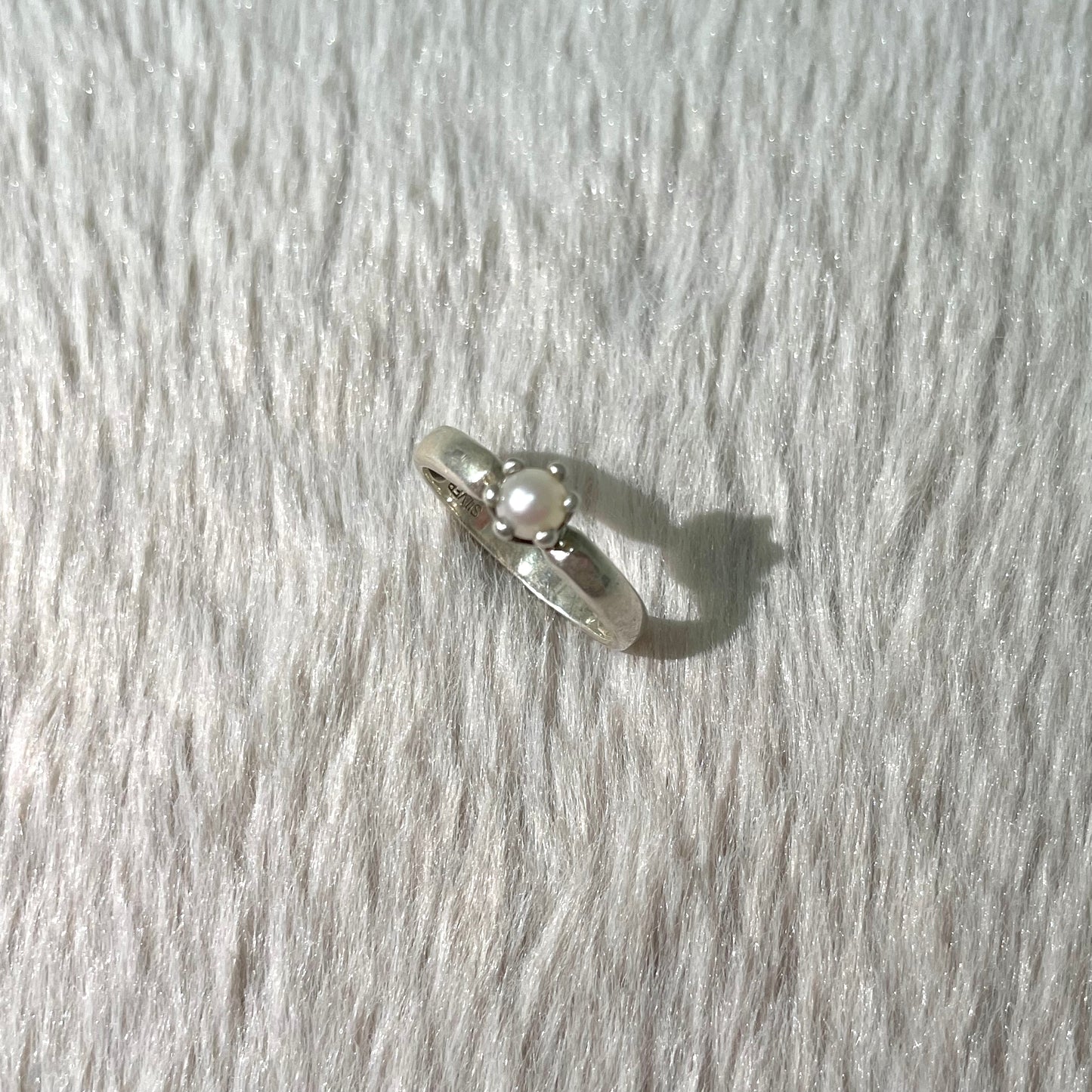 Blue tinged pearl ring