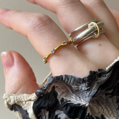 sculpture ring × garland ring