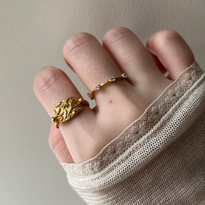 sculpture ring × garland ring