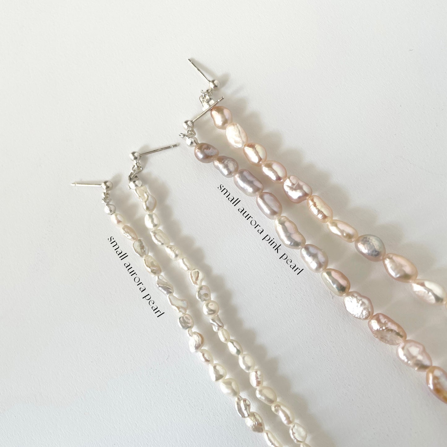 [ small aurora pink pearl ] long-length piercings