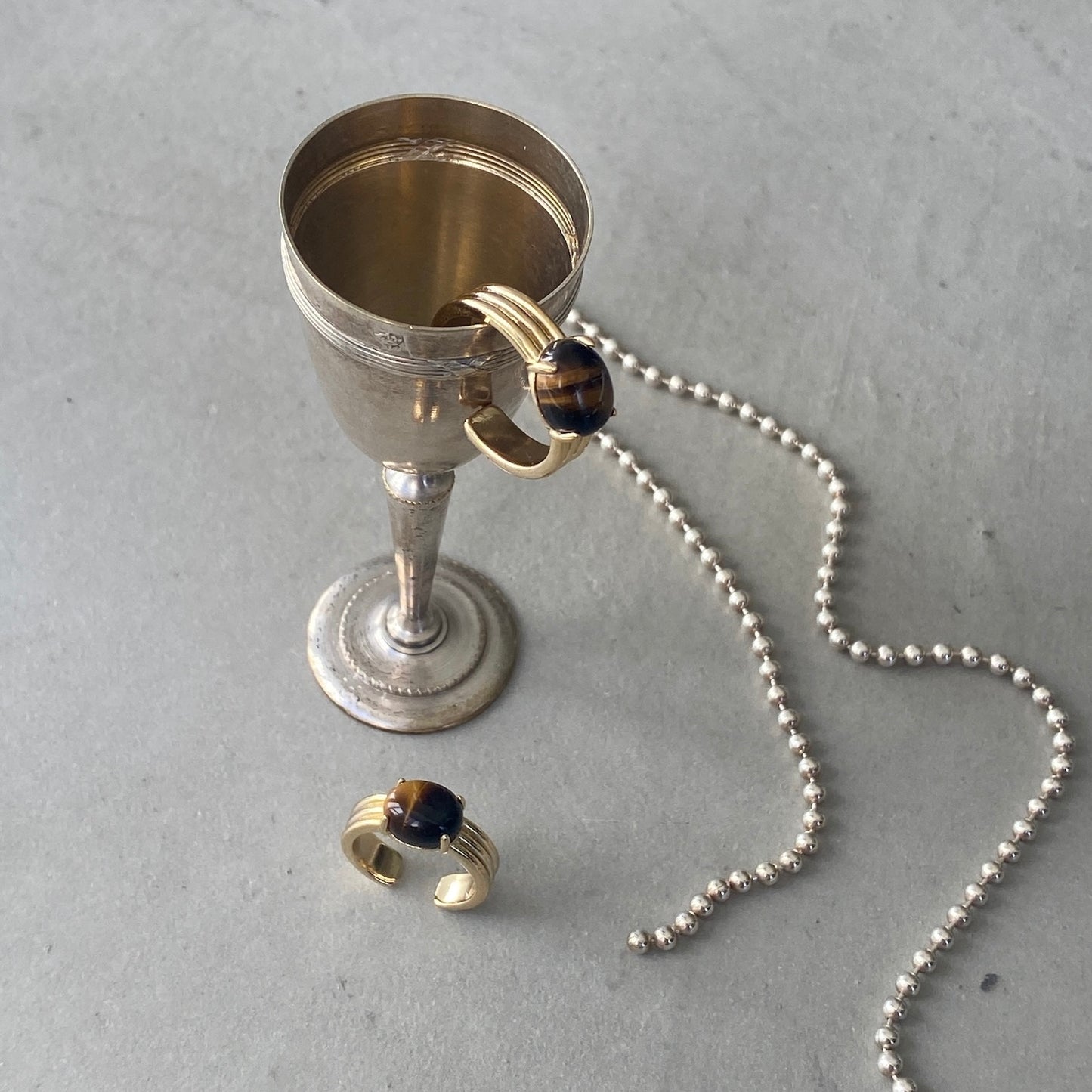 [ tiger eye ]  trois gold