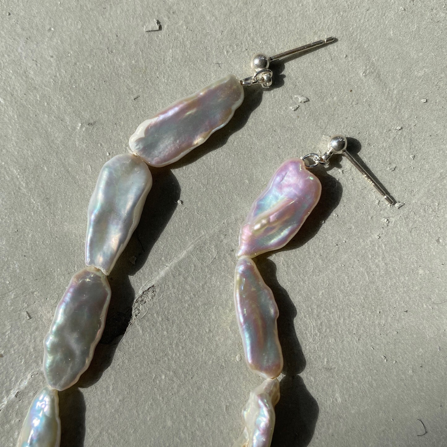 [ aurora pearl ] mid-length piercings