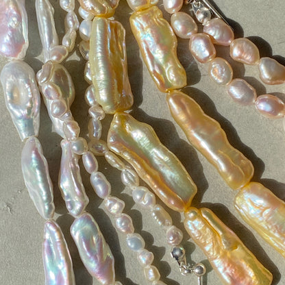 [ aurora pearl ] mid-length piercings